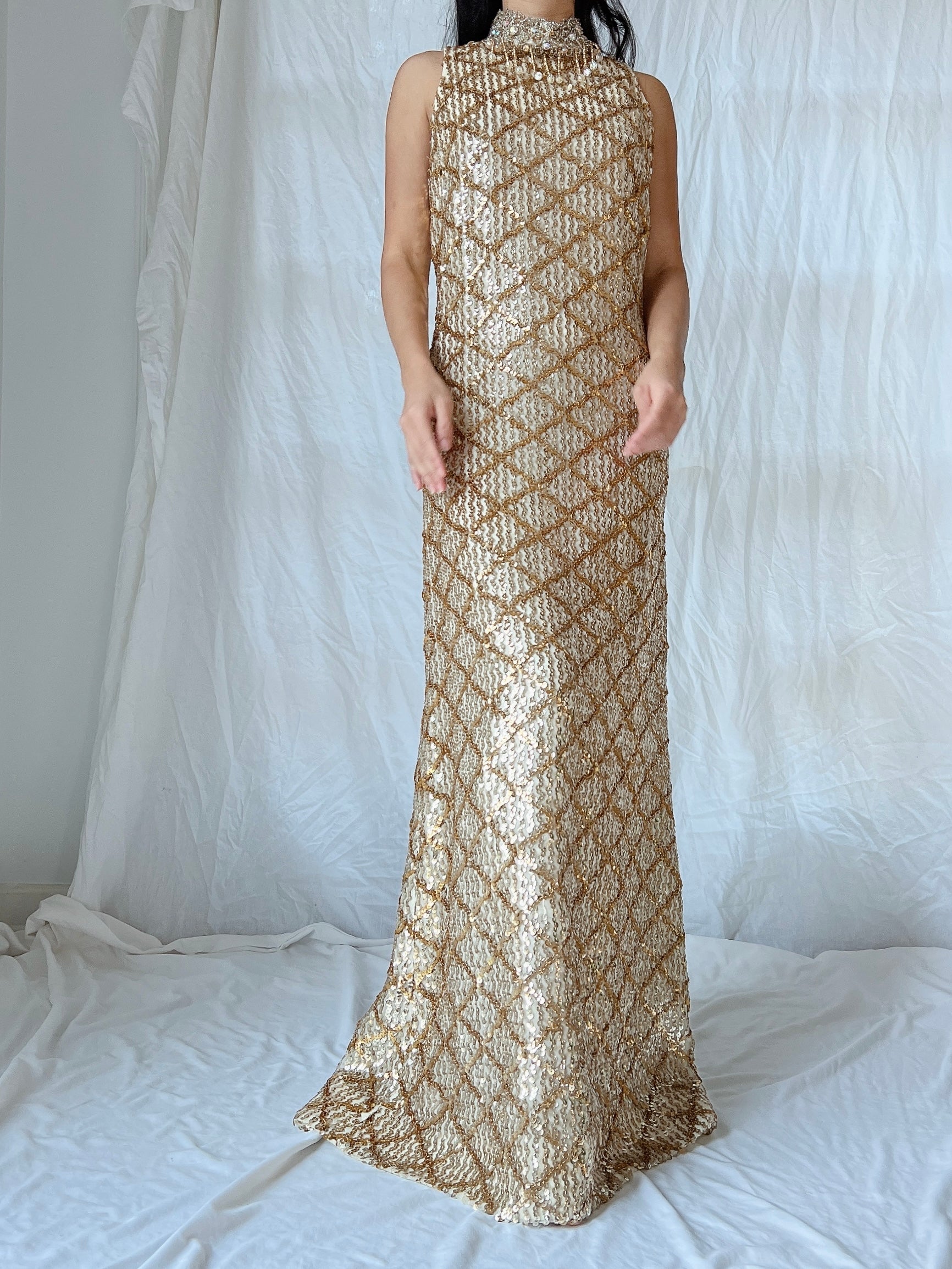 draper james gold sequin dress Made for unforgettable moments Drenched in gold sequins, the Marella Halter-Neck Maxi Dress is a statement of light made for the dance floor #FLANNEL #SequinDress